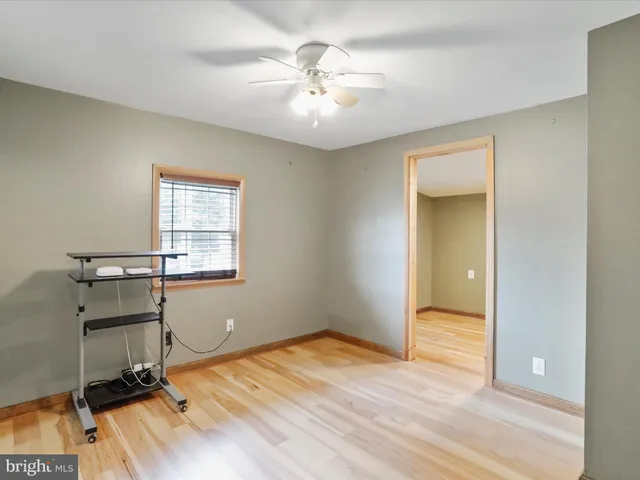 a workspace with furniture and window