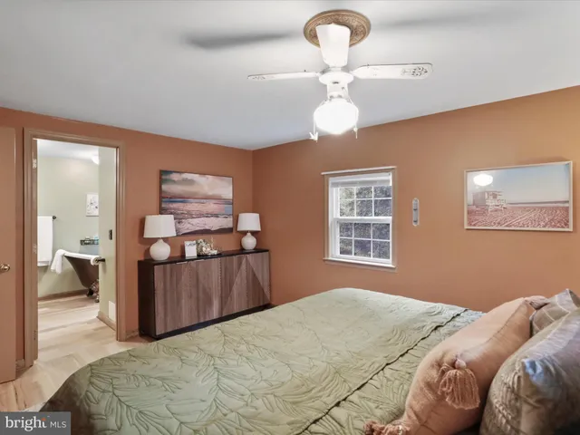 a backyard of a house with lots of trees