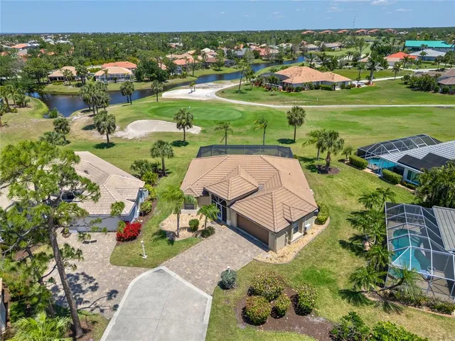 an aerial view of a house with a garden