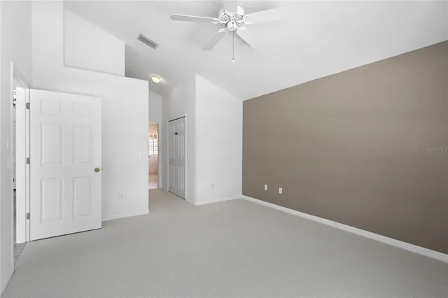 a spacious bathroom with a double vanity sink mirror and