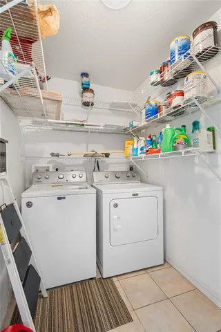 a view of a swimming pool with a yard