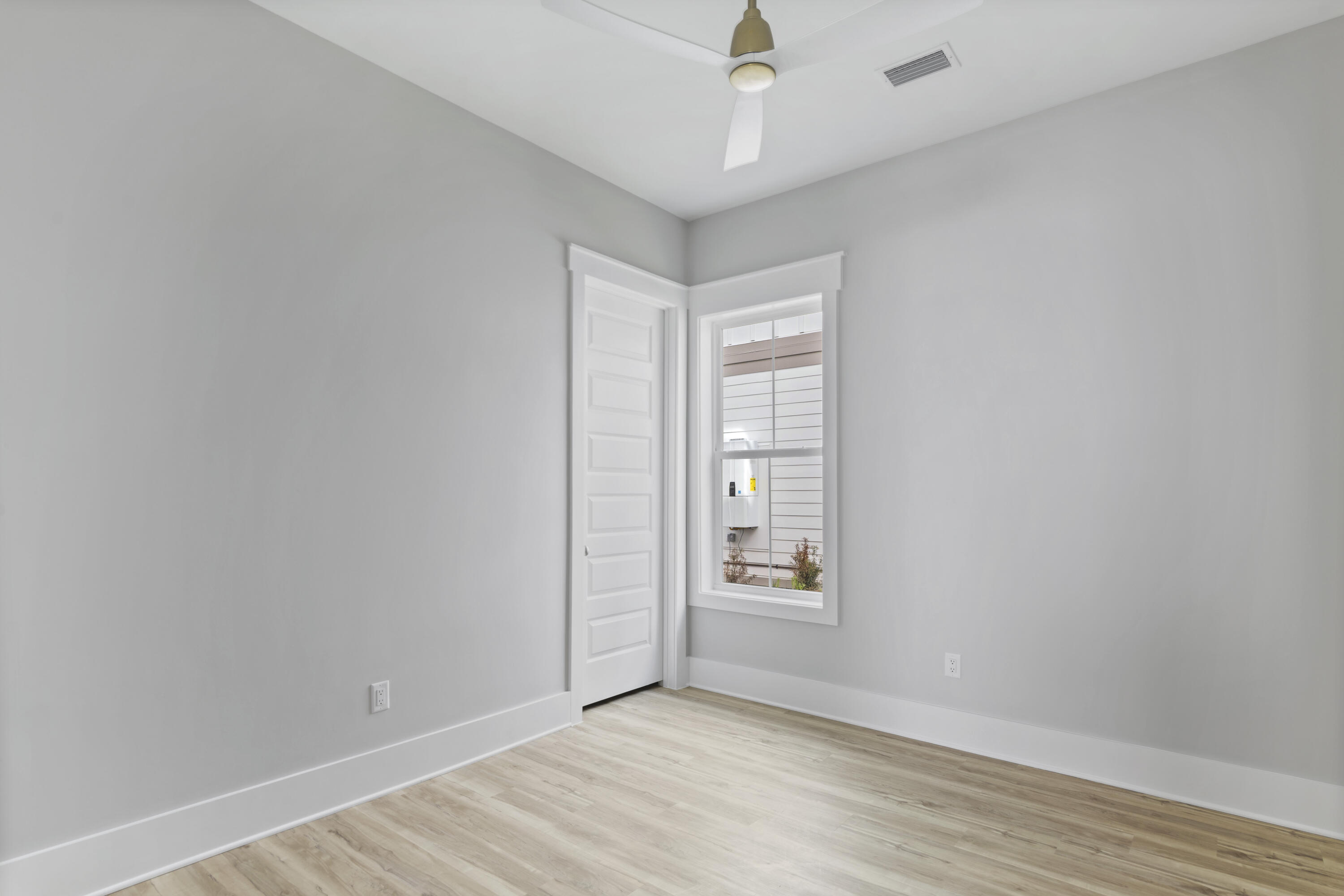 21 West Queen Palm Dr Inlet Beach Inlet Beach, FL 32461 - Photo 14 of 85 an empty room with windows and closet