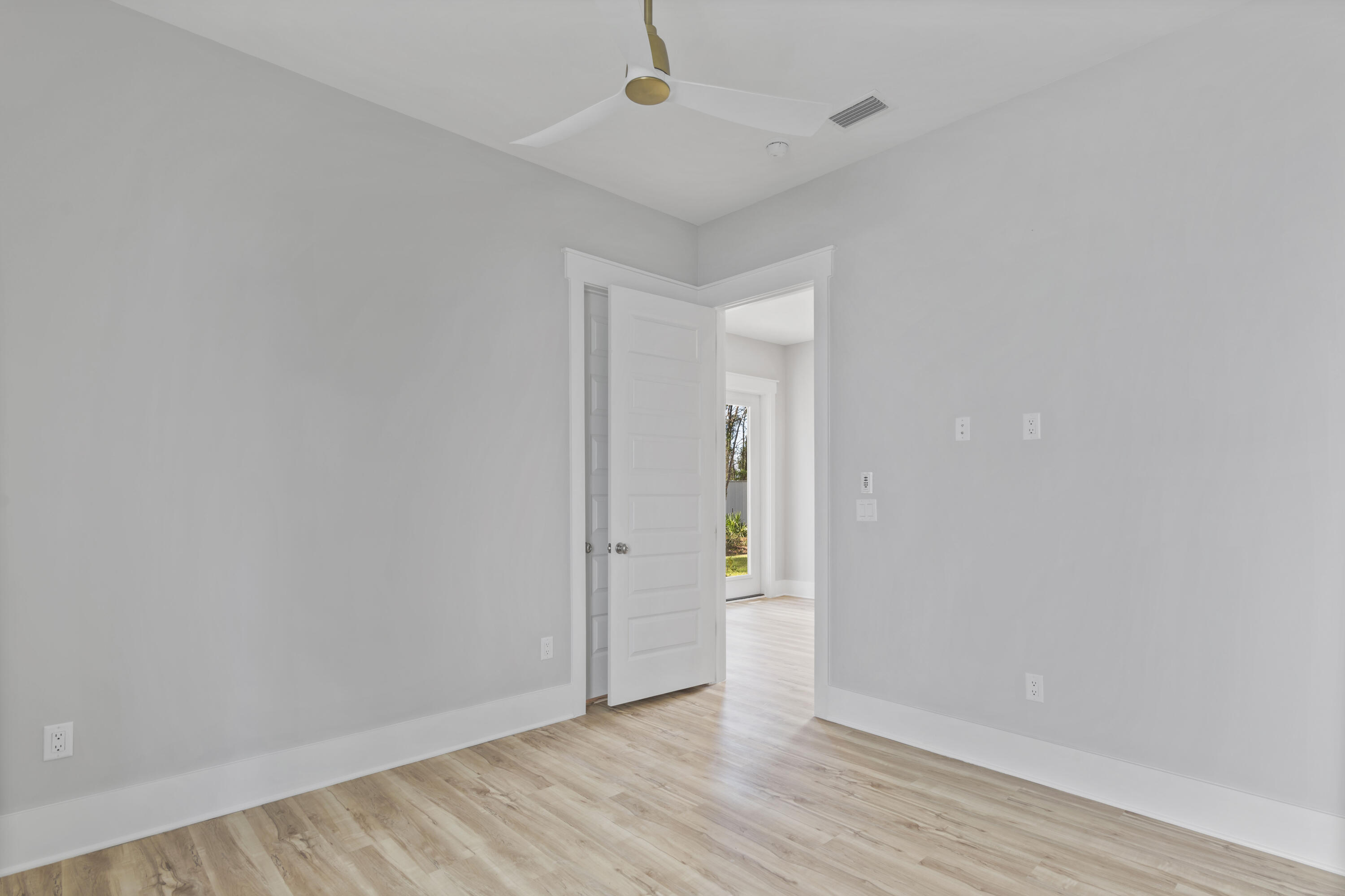 21 West Queen Palm Dr Inlet Beach Inlet Beach, FL 32461 - Photo 16 of 85 a view of an empty room with wooden floor