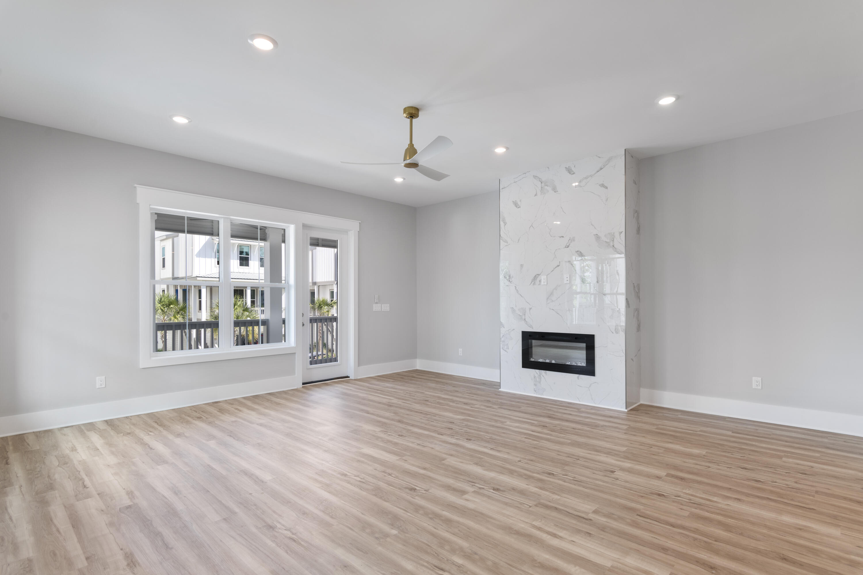21 West Queen Palm Dr Inlet Beach Inlet Beach, FL 32461 - Photo 25 of 85 wooden floor in an empty room with a window