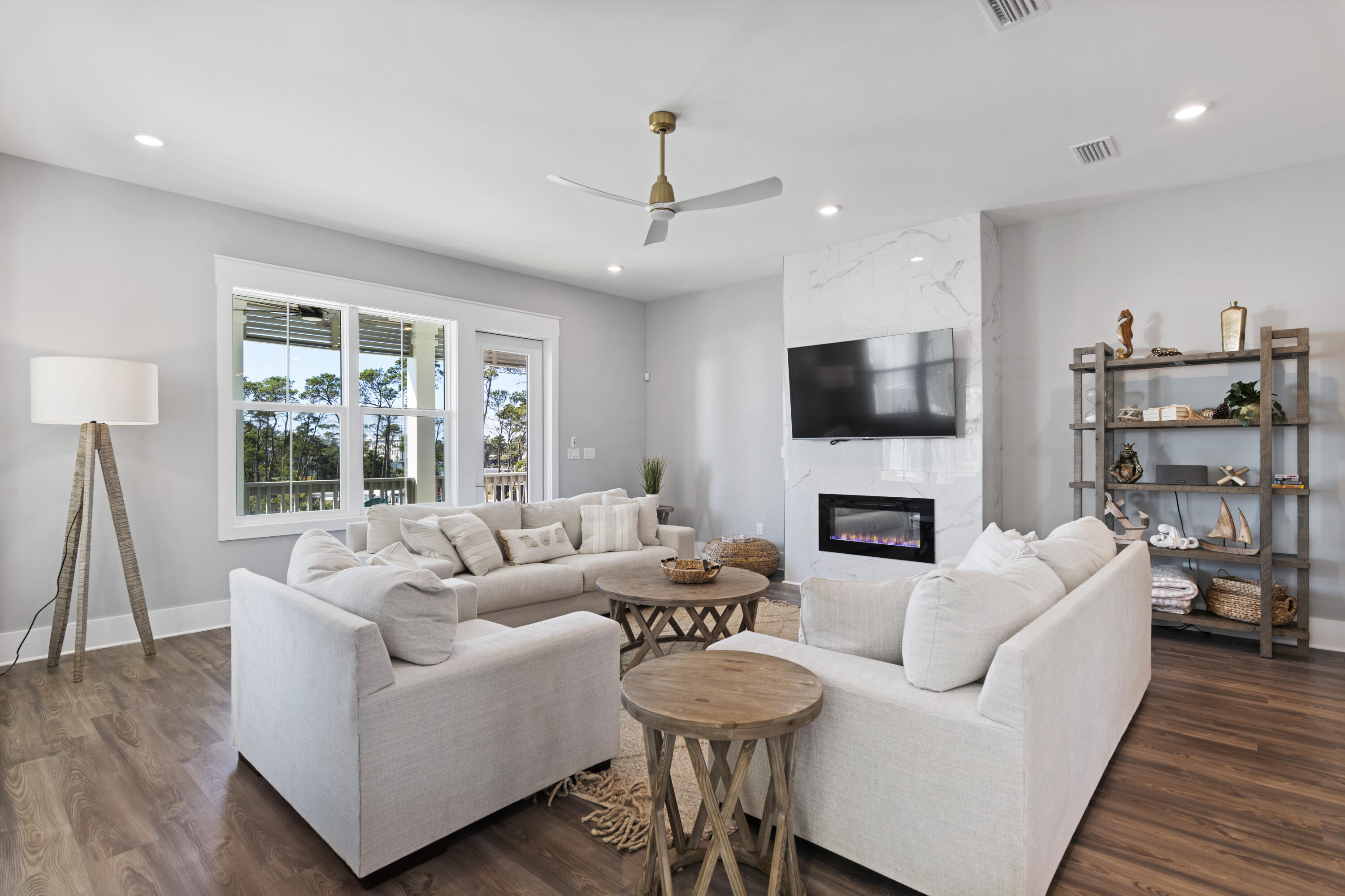 21 West Queen Palm Dr Inlet Beach Inlet Beach, FL 32461 - Photo 26 of 85 a living room with furniture a fireplace and a large window
