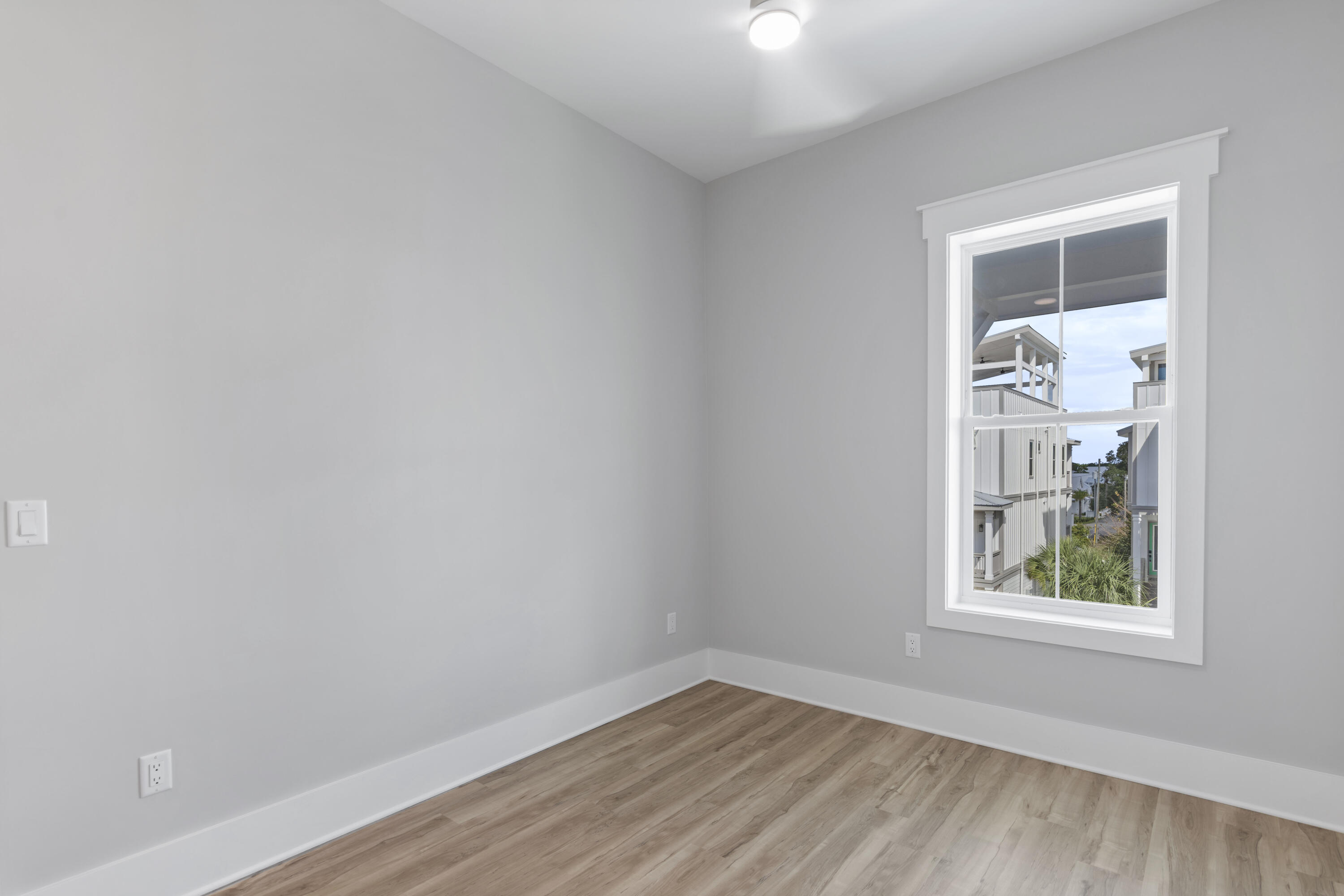 21 West Queen Palm Dr Inlet Beach Inlet Beach, FL 32461 - Photo 44 of 85 an empty room with a window