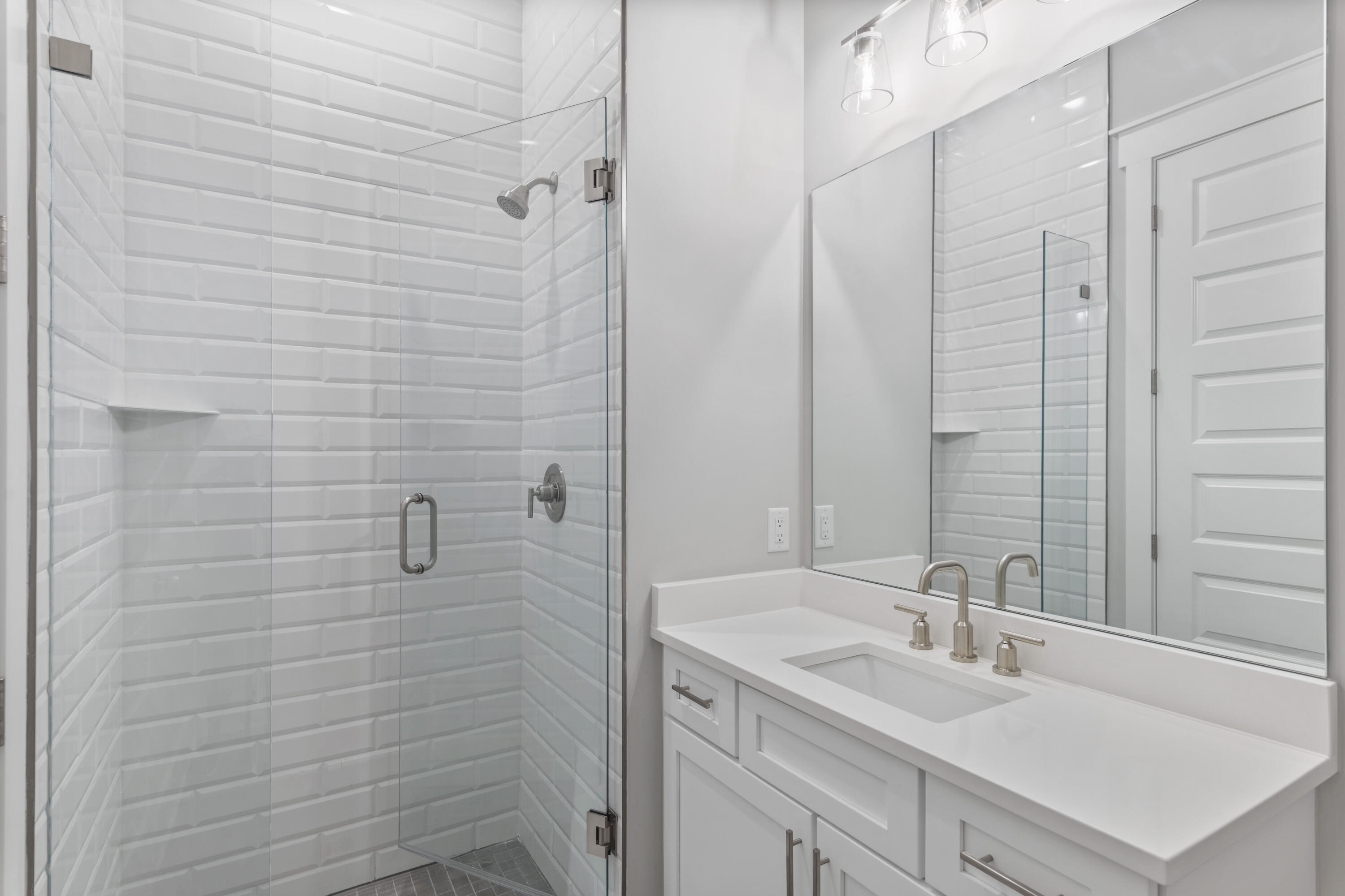 21 West Queen Palm Dr Inlet Beach Inlet Beach, FL 32461 - Photo 54 of 85 a bathroom with a granite countertop sink a shower and a mirror