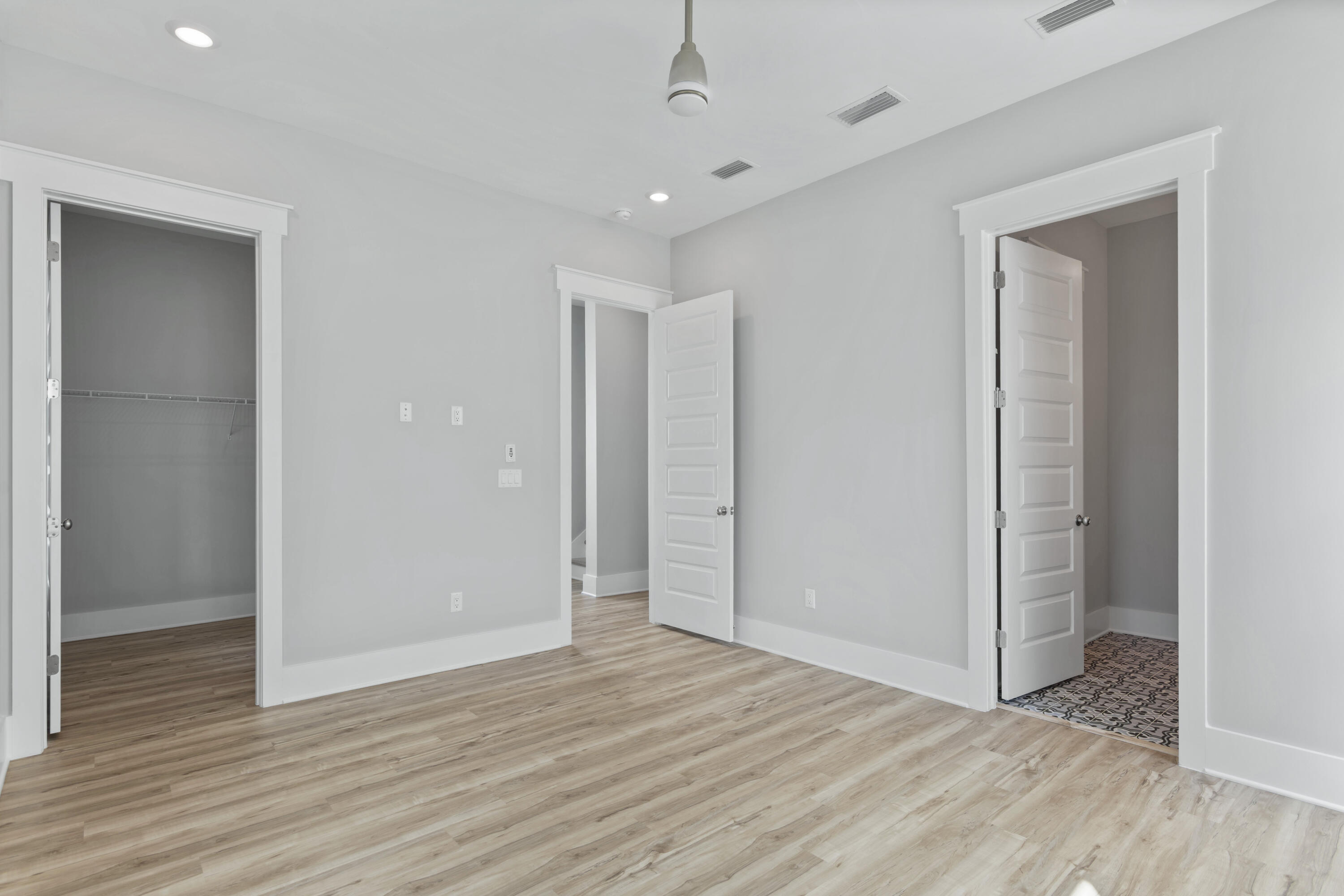 21 West Queen Palm Dr Inlet Beach Inlet Beach, FL 32461 - Photo 57 of 85 a view of an empty room with wooden floor