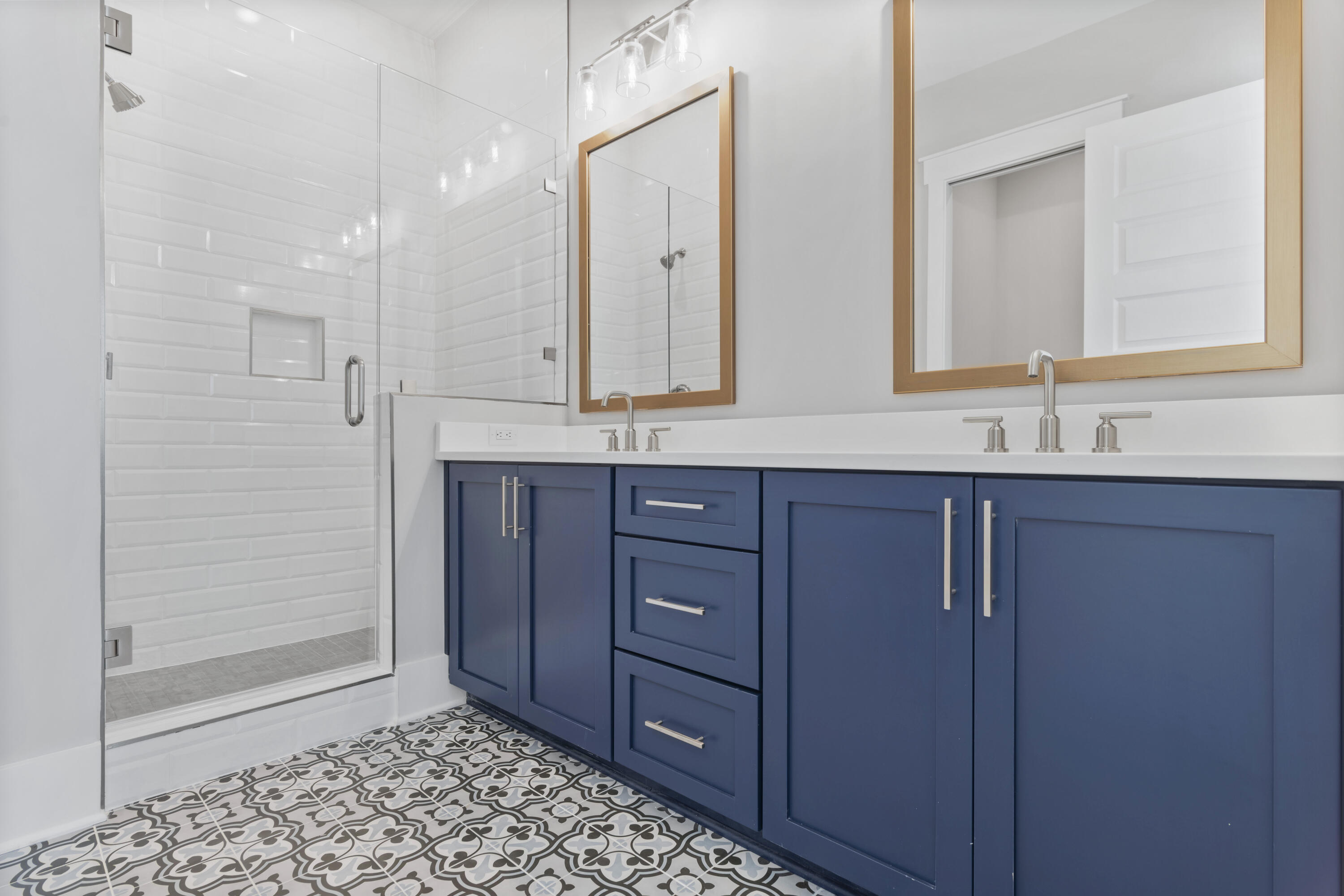 21 West Queen Palm Dr Inlet Beach Inlet Beach, FL 32461 - Photo 59 of 85 a bathroom with a double vanity sink and mirror