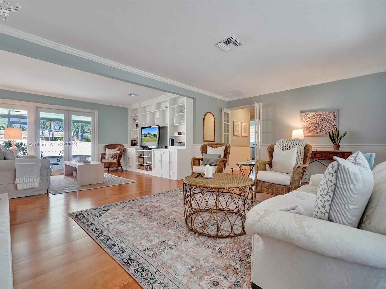 3445 Fillmore Street Hollywood, FL 33021 - Photo 12 of 76 a living room with furniture and a large window