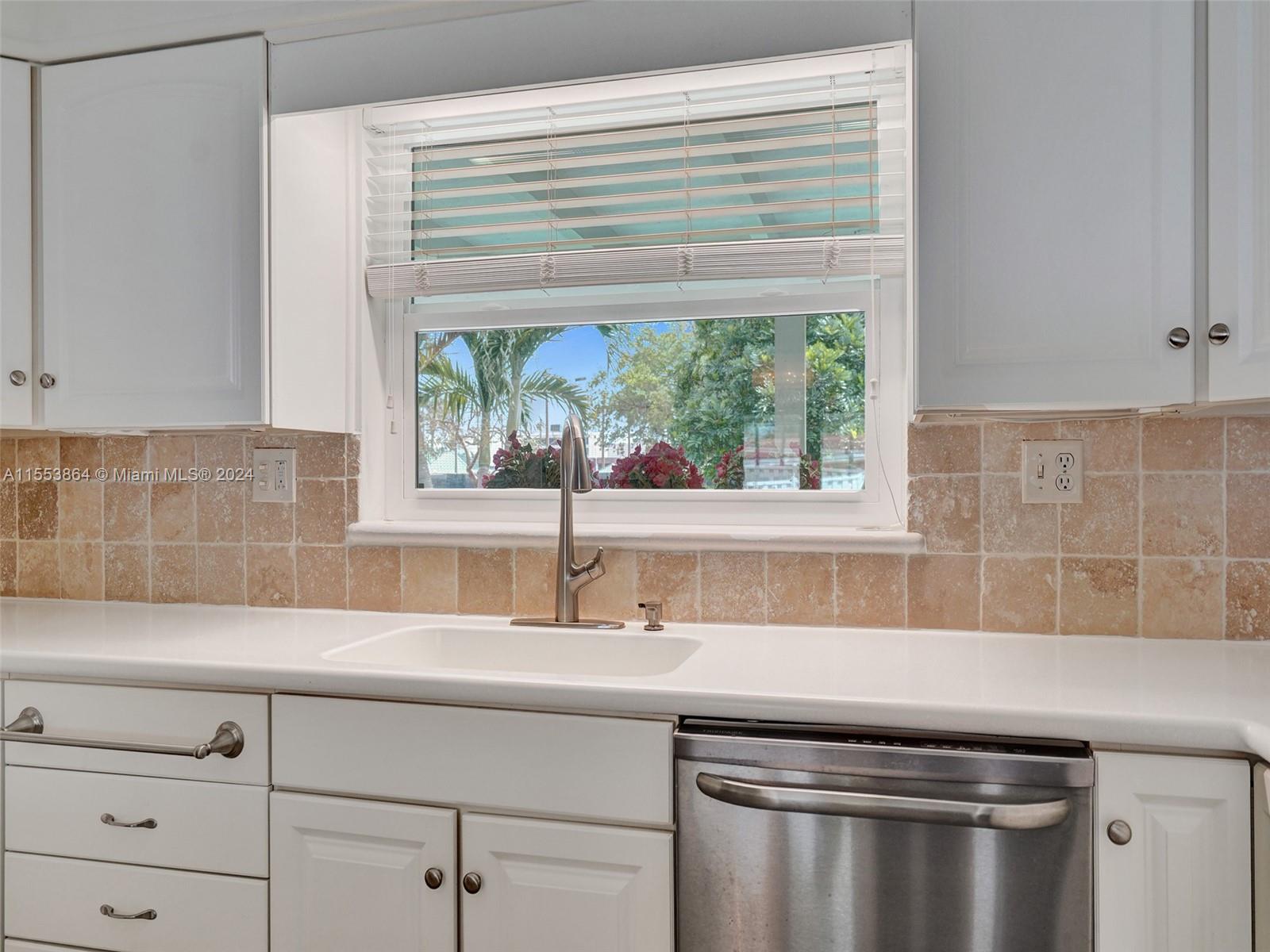 3445 Fillmore Street Hollywood, FL 33021 - Photo 24 of 76 a kitchen with a sink and a window