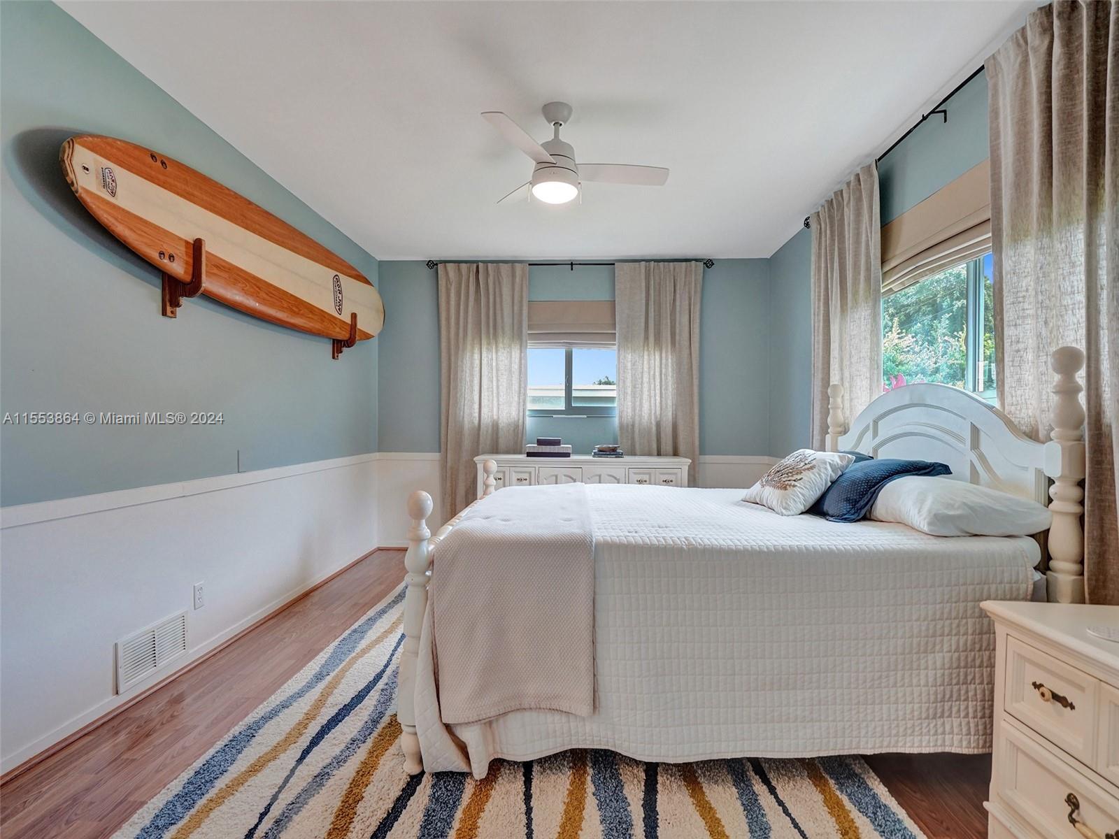 3445 Fillmore Street Hollywood, FL 33021 - Photo 30 of 76 a bedroom with a bed and window