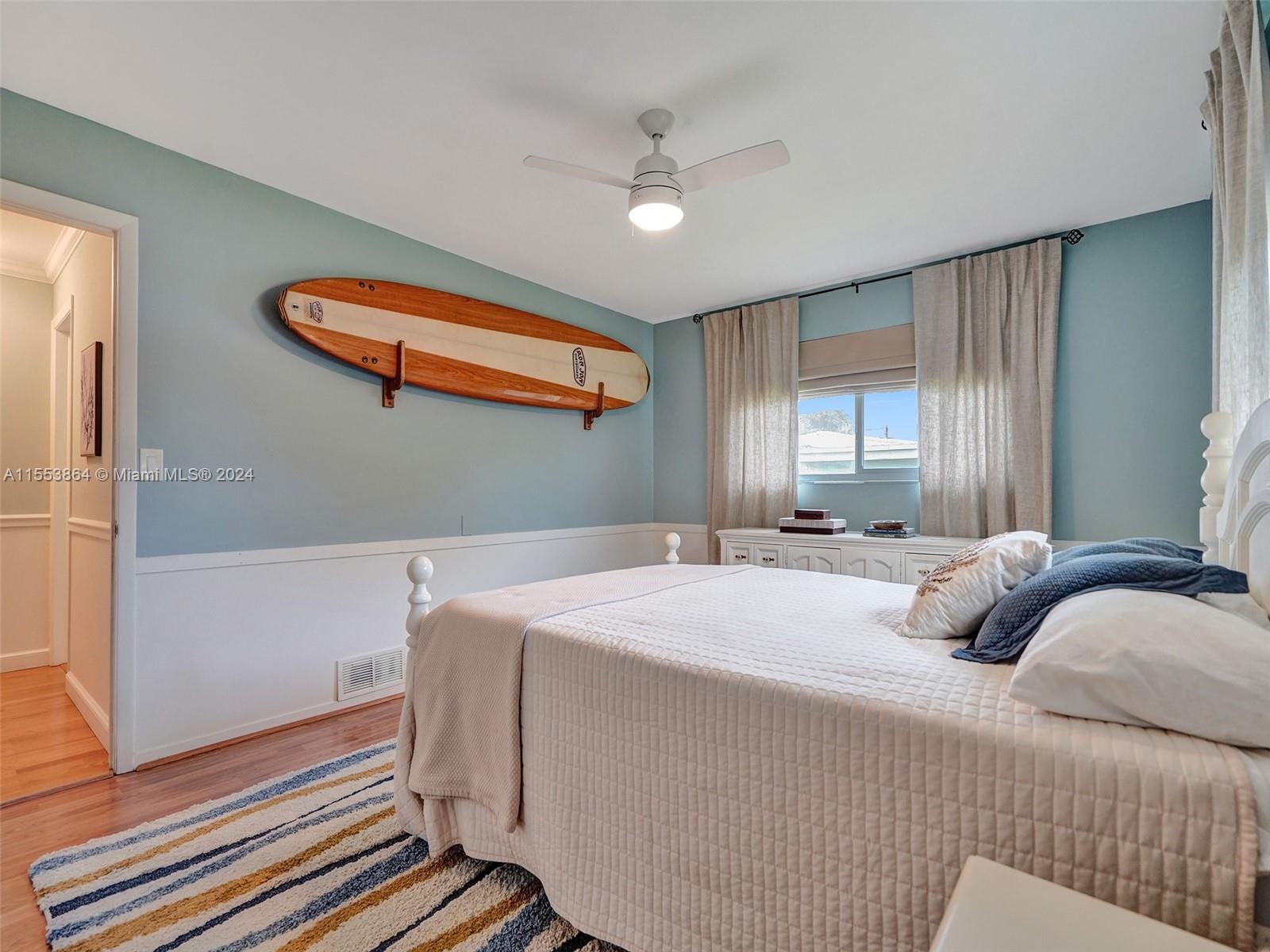 3445 Fillmore Street Hollywood, FL 33021 - Photo 34 of 76 a bedroom with a bed and a window