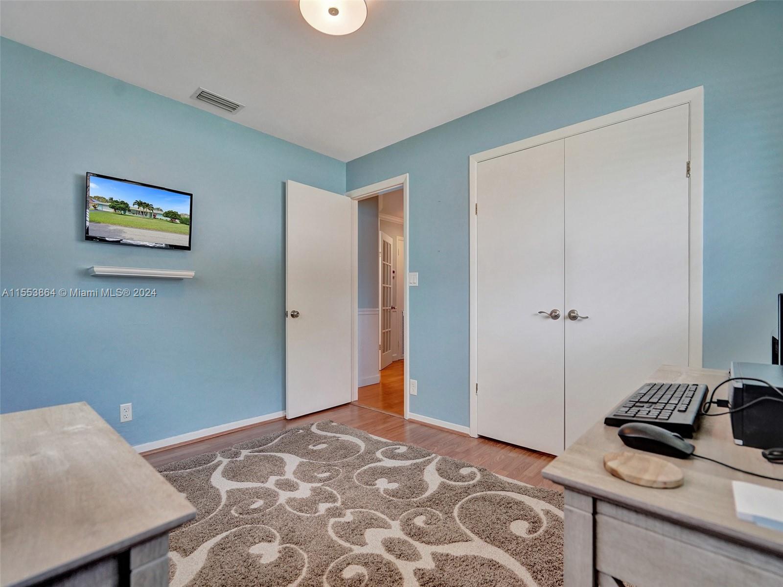 3445 Fillmore Street Hollywood, FL 33021 - Photo 47 of 76 a bedroom with a bed and a area