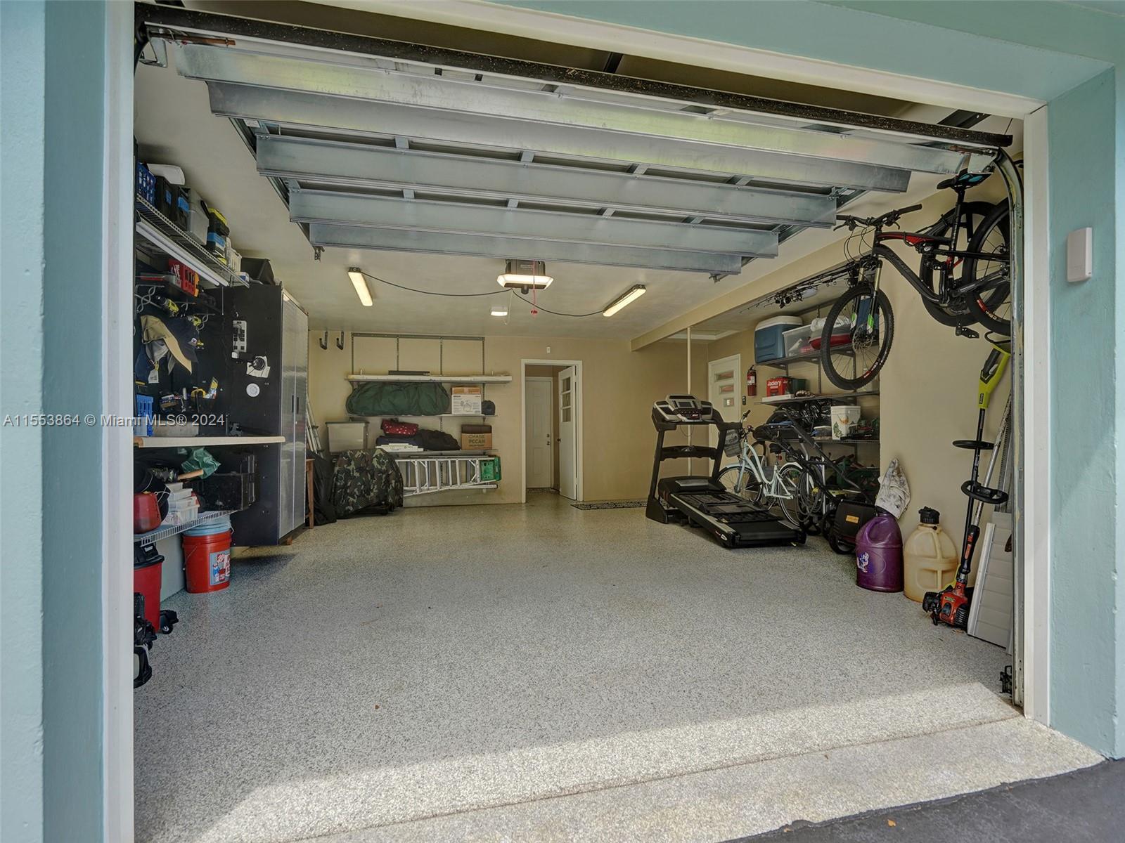 3445 Fillmore Street Hollywood, FL 33021 - Photo 50 of 76 a view of a storage room with a lot of stuff