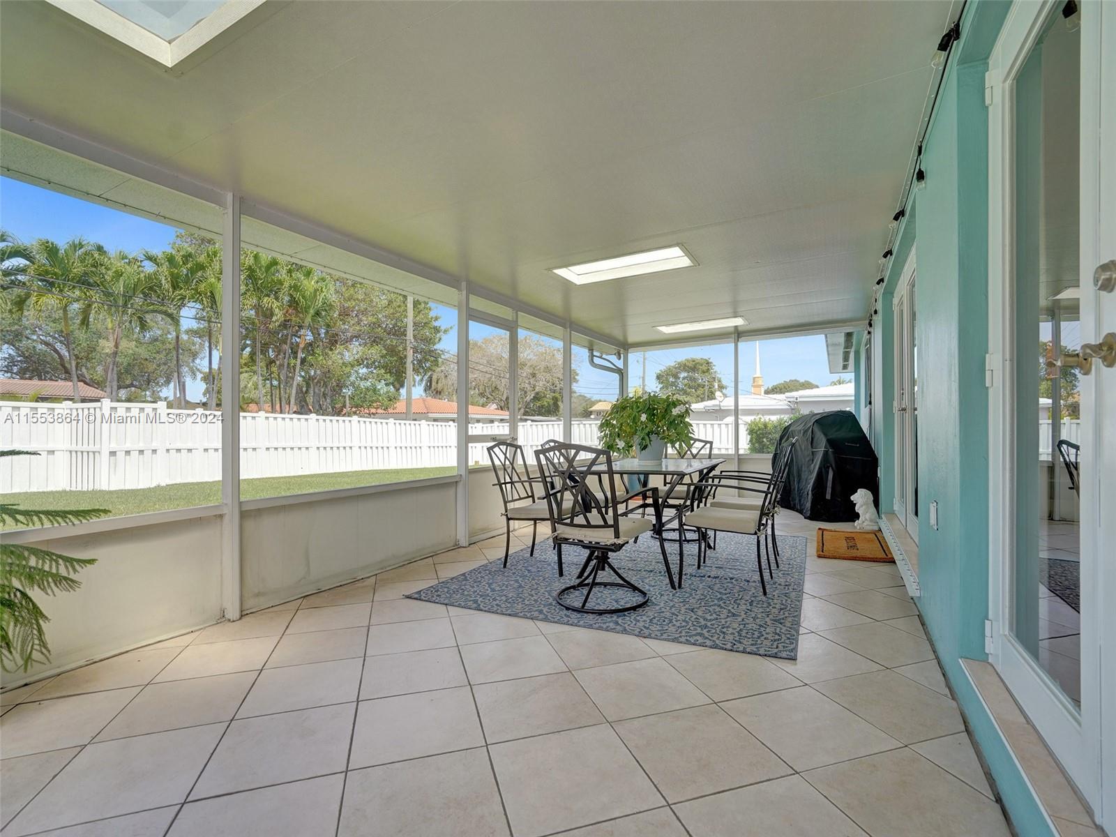 3445 Fillmore Street Hollywood, FL 33021 - Photo 52 of 76 a view of a dining room with furniture window and outside view