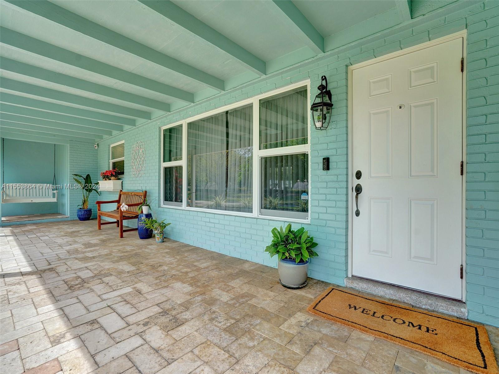 3445 Fillmore Street Hollywood, FL 33021 - Photo 64 of 76 a view of a room with furniture and front door