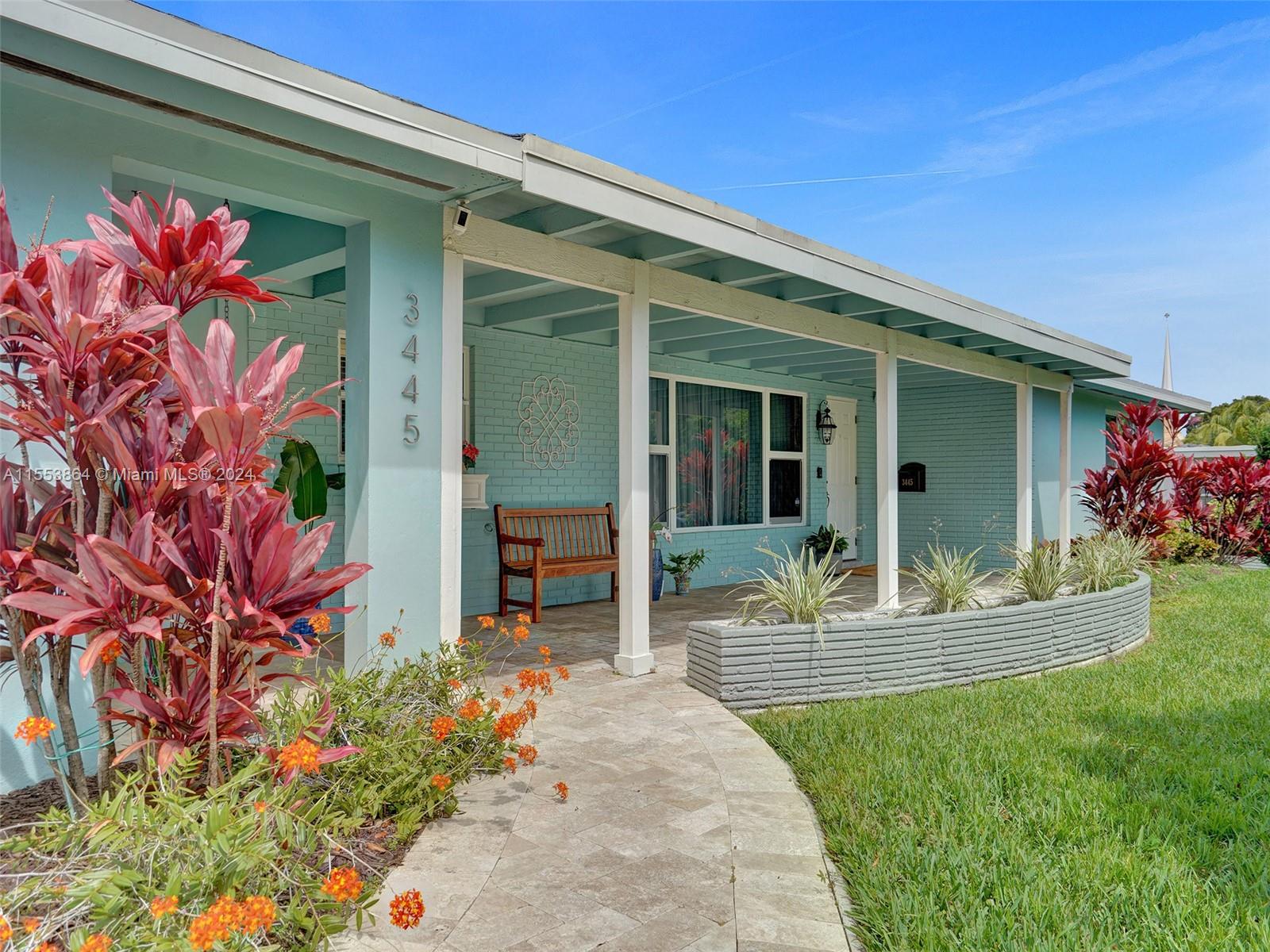 3445 Fillmore Street Hollywood, FL 33021 - Photo 67 of 76 a house view with a garden space