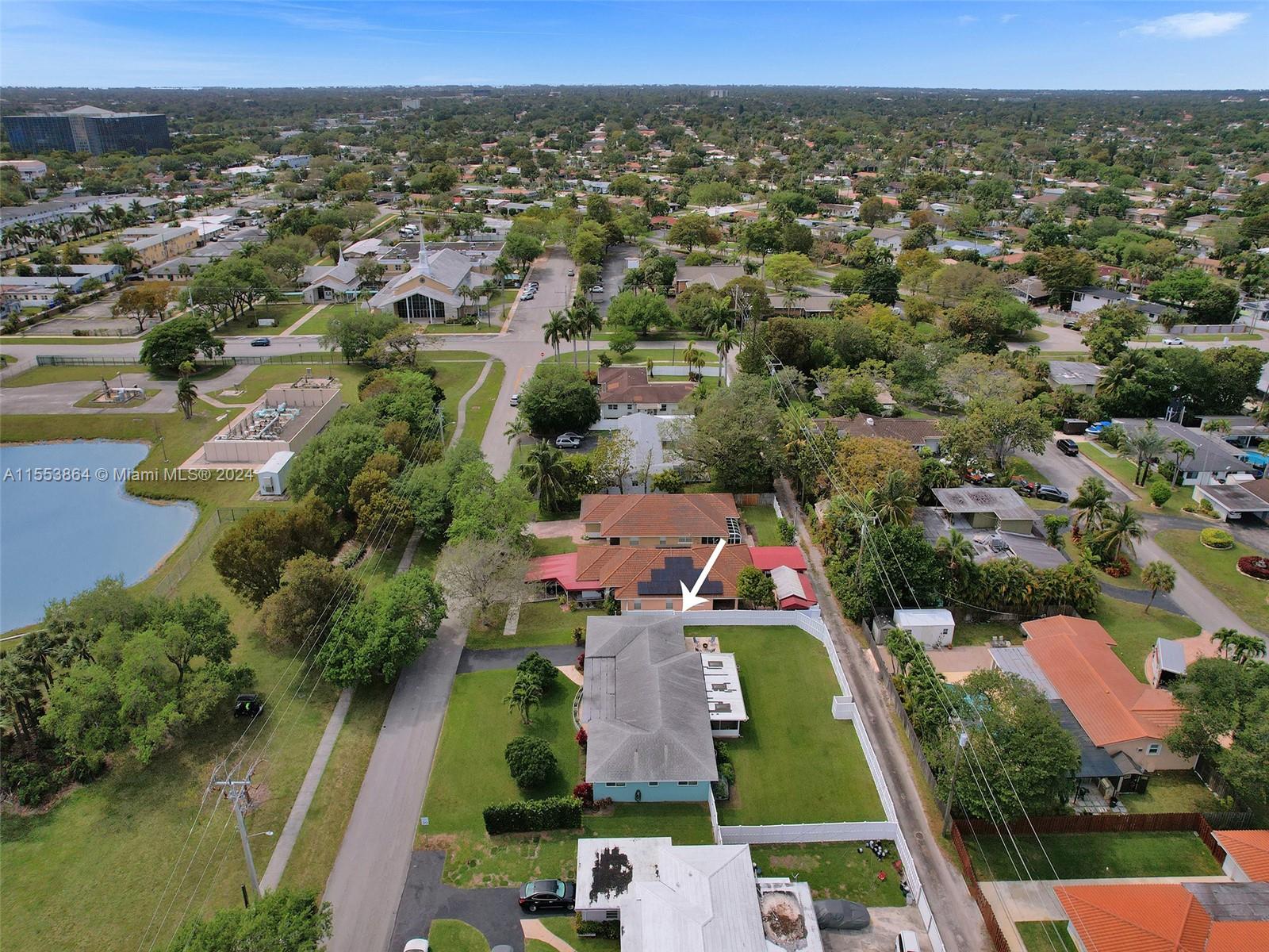 3445 Fillmore Street Hollywood, FL 33021 - Photo 74 of 76 an aerial view of residential houses with outdoor space and lake view