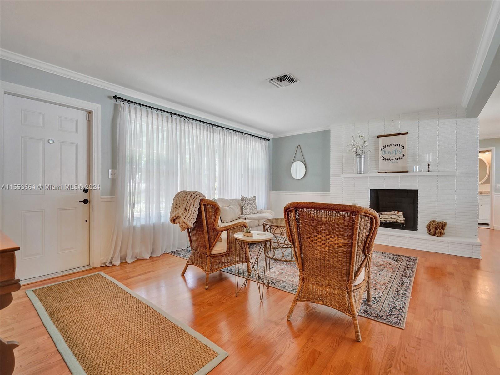 3445 Fillmore Street Hollywood, FL 33021 - Photo 9 of 76 a dining room with furniture and wooden floor