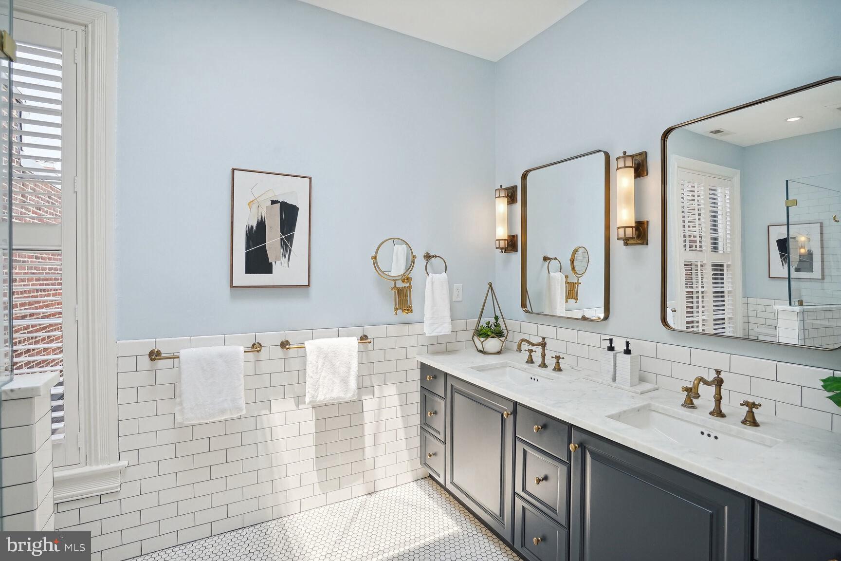 1102 East Capitol Street Northeast Washington, DC 20002 - Photo 13 of 28 Spa-like Primary Bathroom with dual sinks