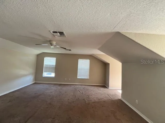 a view of a livingroom with a staircase