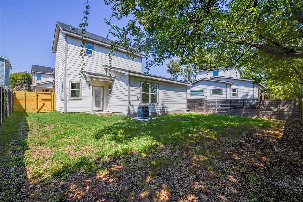 7103 Bennett Avenue, Unit 2 Austin, TX 78752 - Photo 19 of 19 a front view of a house with garden
