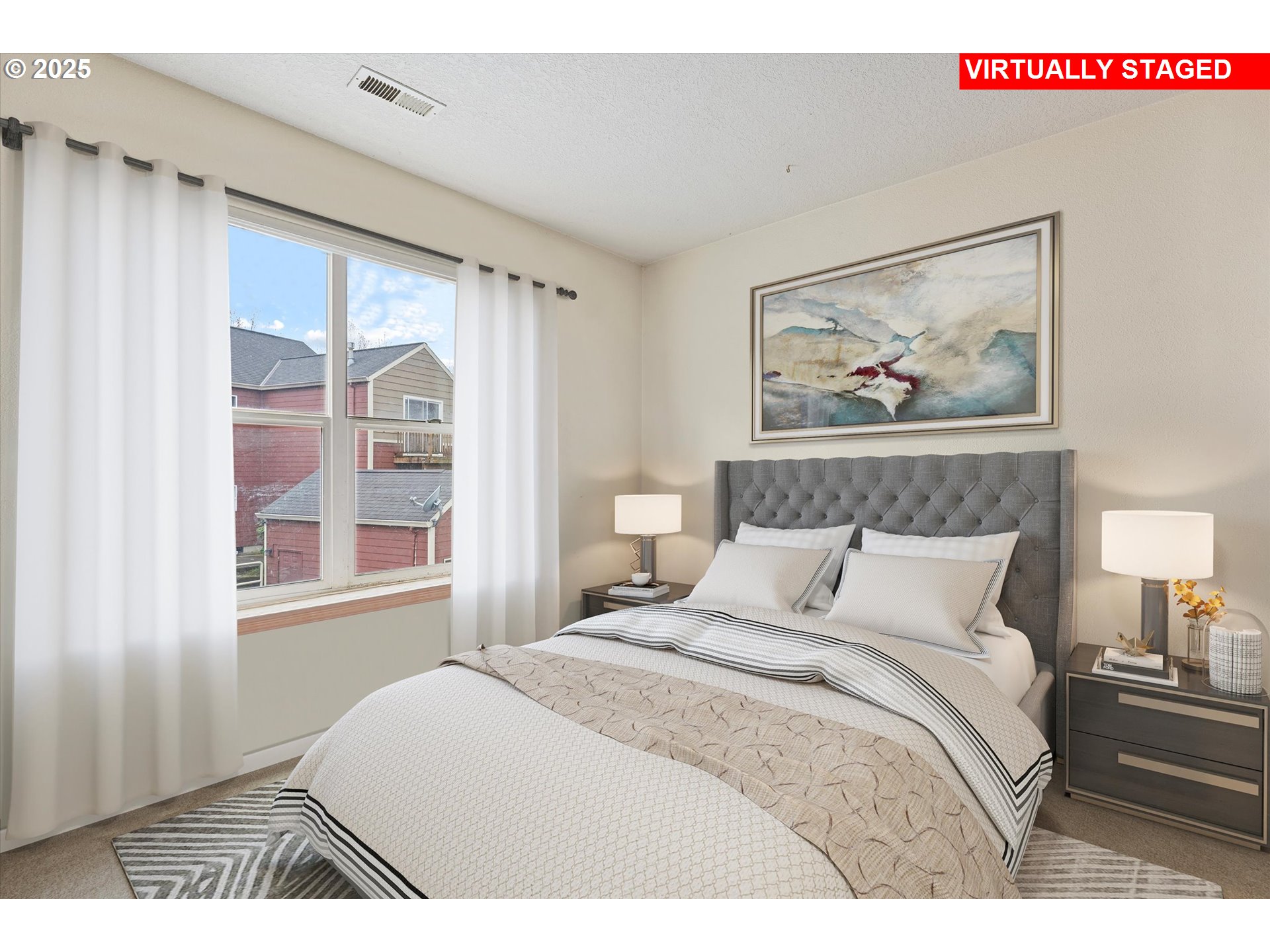 15723 Northeast Beech Street Portland, OR 97230 - Photo 6 of 9 a bedroom with a bed and a painting on the wall