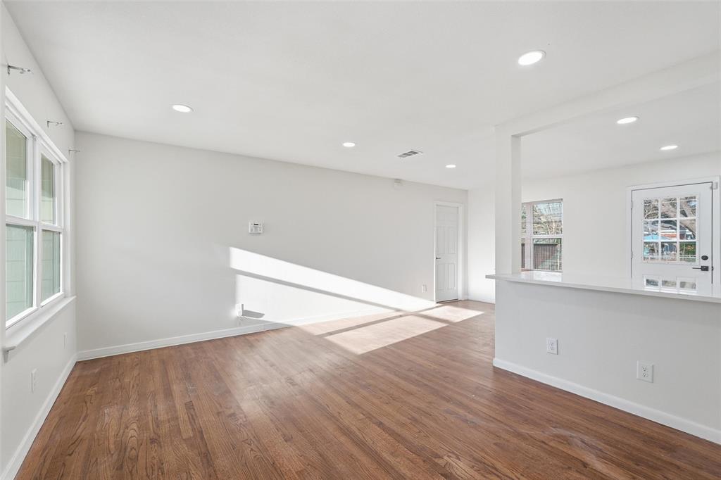 10833 Ruth Ann Drive Dallas, TX 75228 - Photo 3 of 17 a view of a kitchen with wooden floor