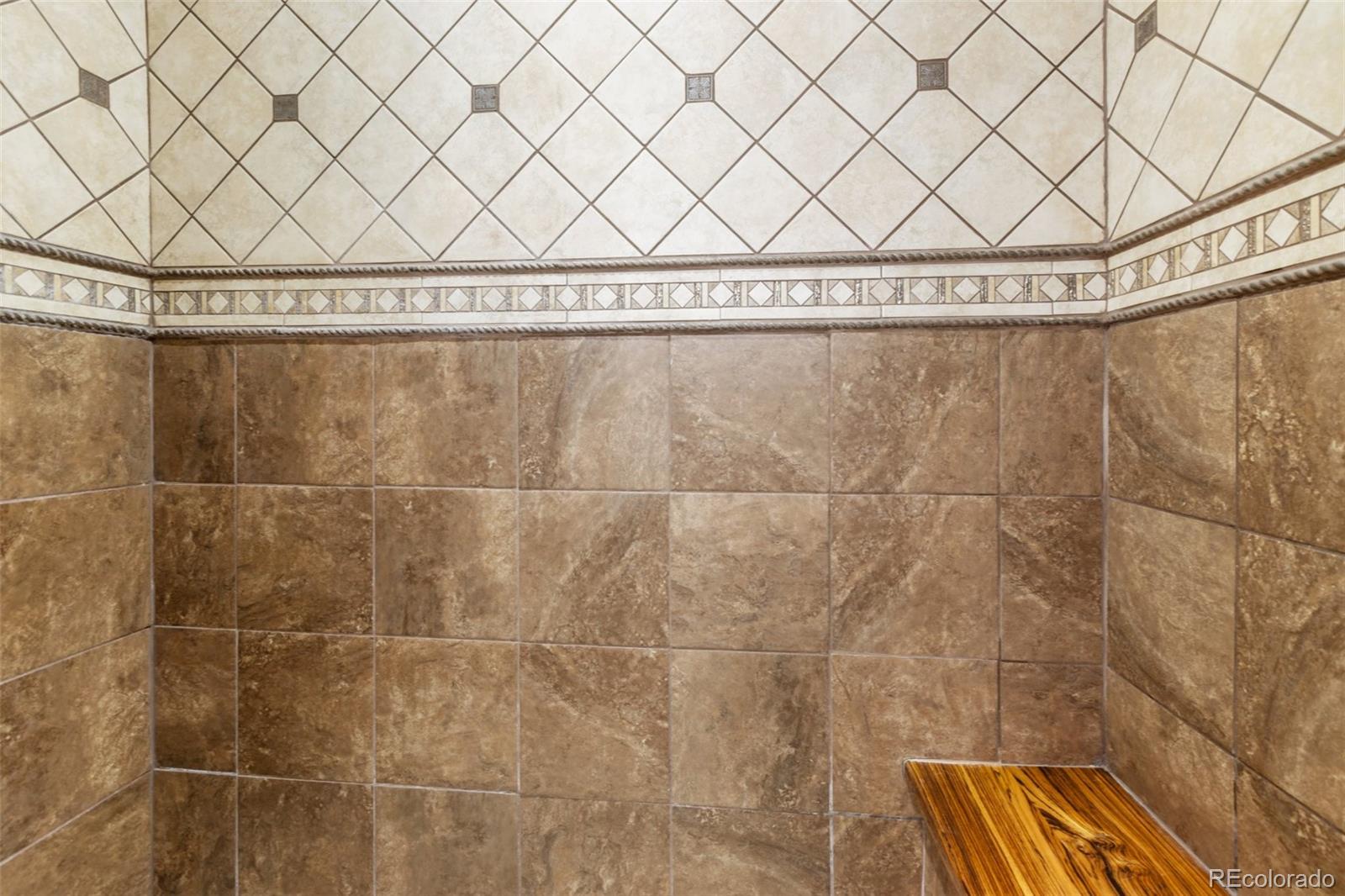 111 Blue Spruce Road Divide, CO 80814 - Photo 27 of 46 a bathroom with a shower and a window