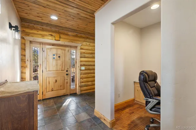 a view of a hallway with workspace