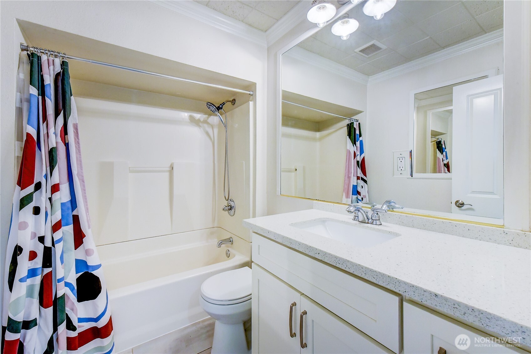 1048 South Director Street Seattle, WA 98108 - Photo 12 of 20 a bathroom with a sink a toilet and a mirror