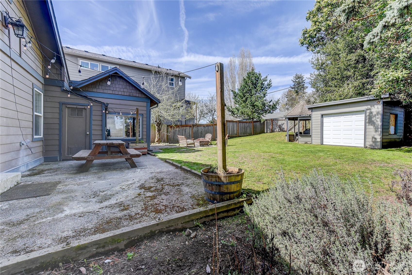 1048 South Director Street Seattle, WA 98108 - Photo 18 of 20 a view of a house with backyard and porch