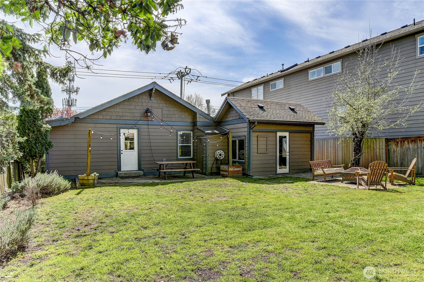 1048 South Director Street Seattle, WA 98108 - Photo 20 of 20 a front view of a house with patio and garden