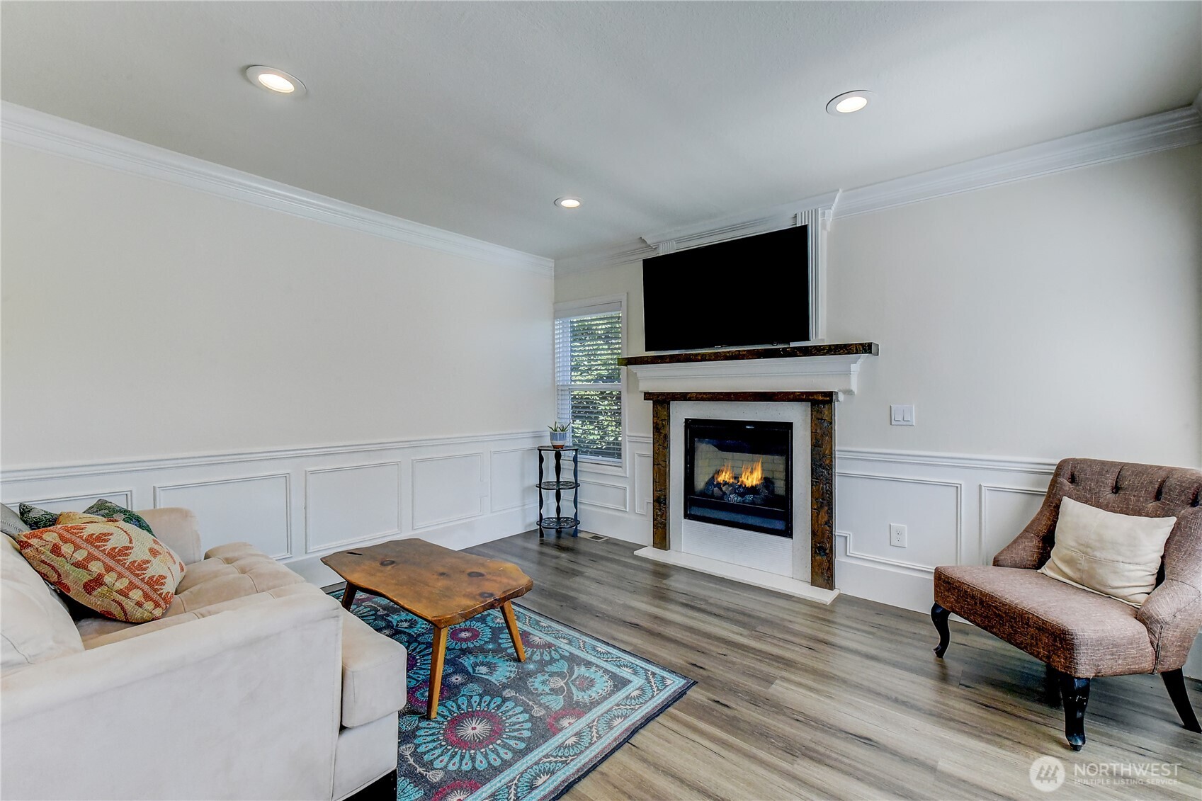 1048 South Director Street Seattle, WA 98108 - Photo 3 of 20 a living room with furniture and a fireplace