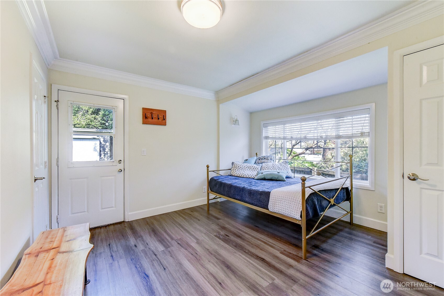 1048 South Director Street Seattle, WA 98108 - Photo 9 of 20 a room with wooden floor and window