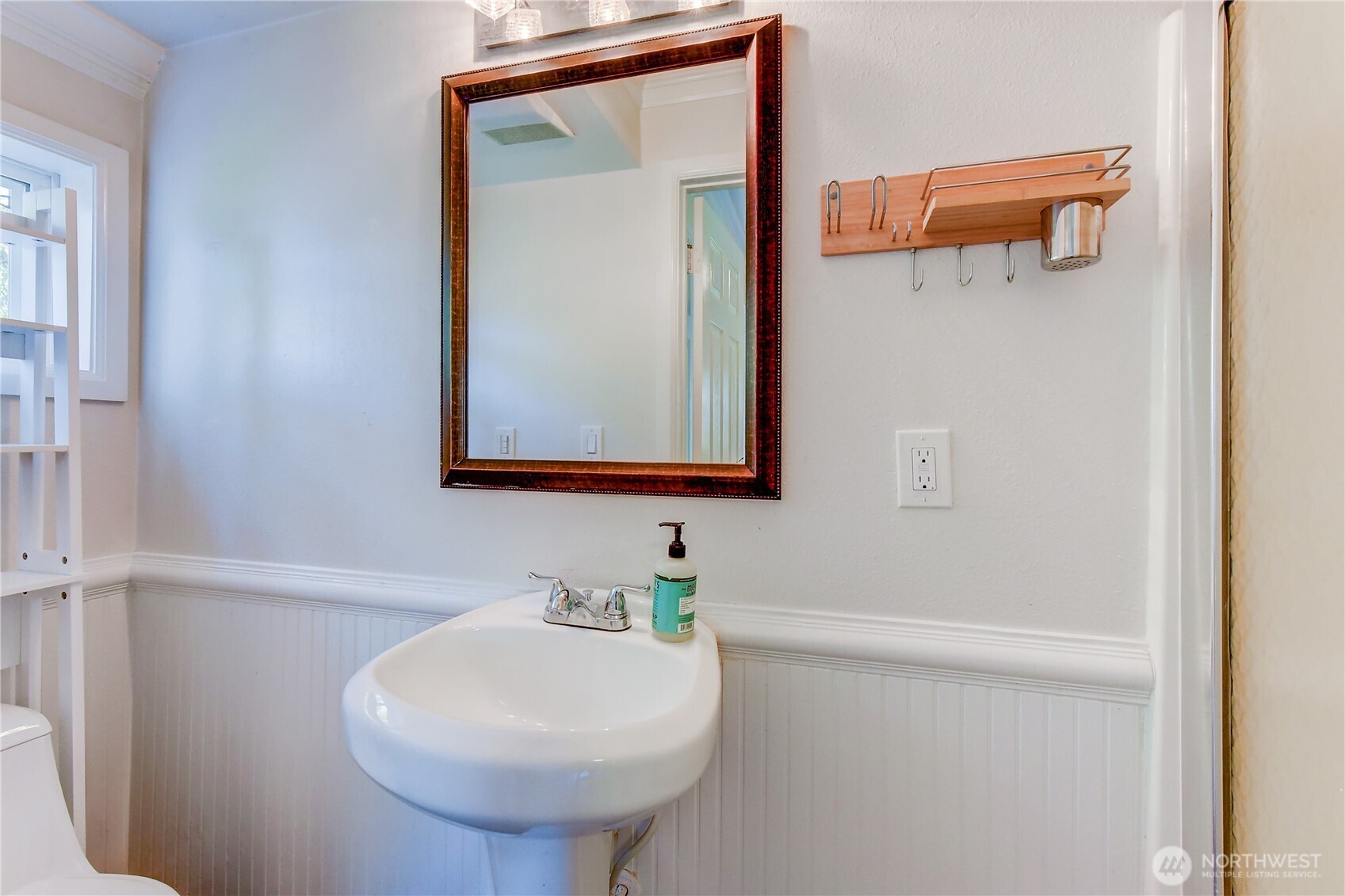 1048 South Director Street Seattle, WA 98108 - Photo 10 of 20 a bathroom with a sink and a mirror