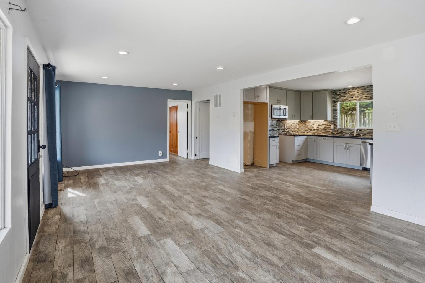 17918 Pesante Road Prunedale, CA 93907 - Photo 15 of 35 a view of a kitchen with refrigerator stove and wooden floor