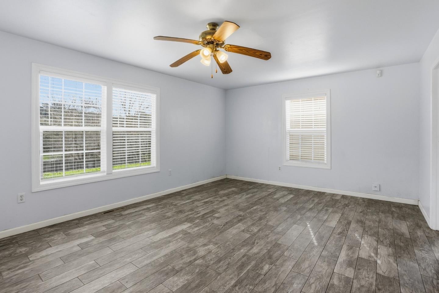 17918 Pesante Road Prunedale, CA 93907 - Photo 16 of 35 an empty room with window and ceiling fan