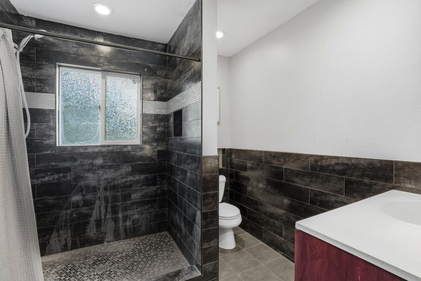 17918 Pesante Road Prunedale, CA 93907 - Photo 19 of 35 a bathroom with a toilet and a shower