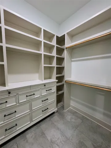 a bathroom with a double vanity sink and mirror