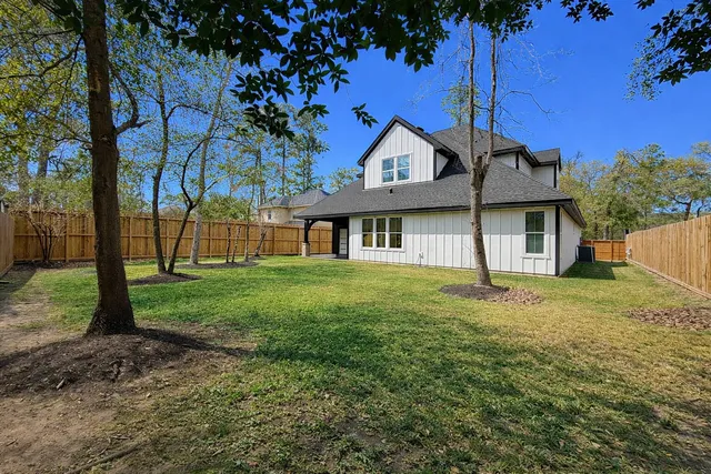 a view of a backyard with a garden