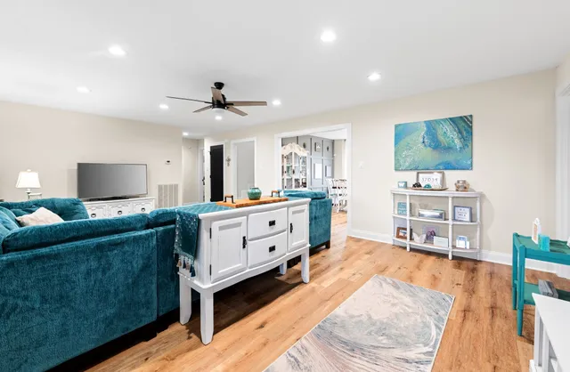 a kitchen with a sink cabinets and refrigerator