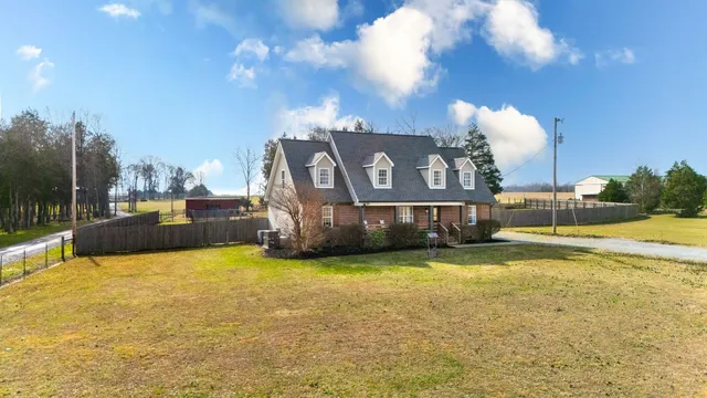 a front view of a house with swimming pool