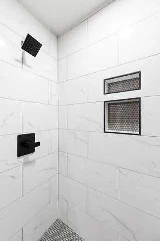 a view of a house with dining room and wooden fence