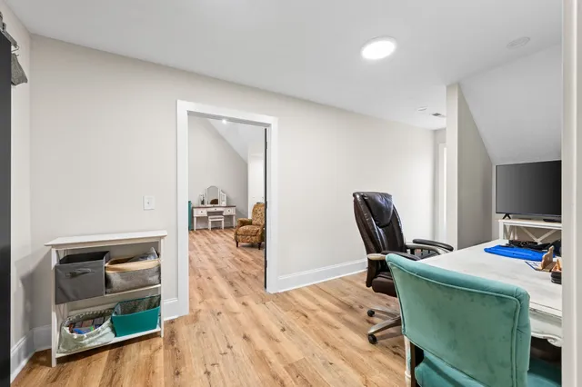 a view of a swimming pool with an outdoor seating