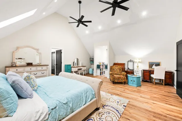 a view of a swimming pool with an outdoor seating and a yard