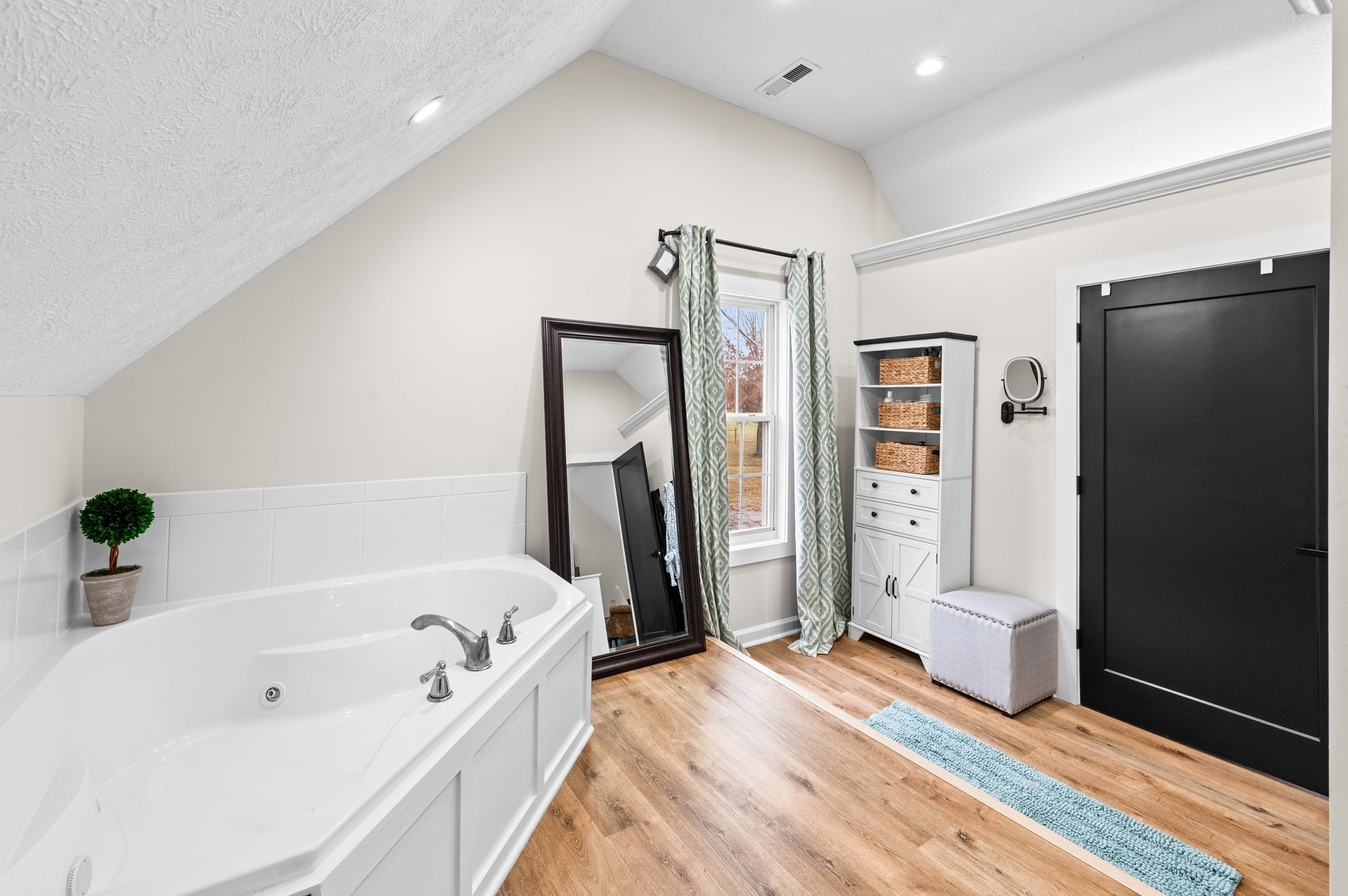1993 Egypt Road Chapel Hill, TN 37034 - Photo 56 of 79 a bathroom with a bathtub and a shower