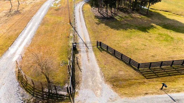 a view of a swimming pool with an outdoor space and seating area