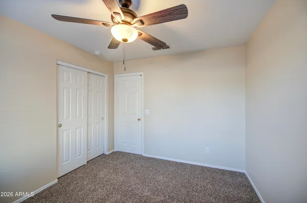 a bathroom with a bath tub with a shower